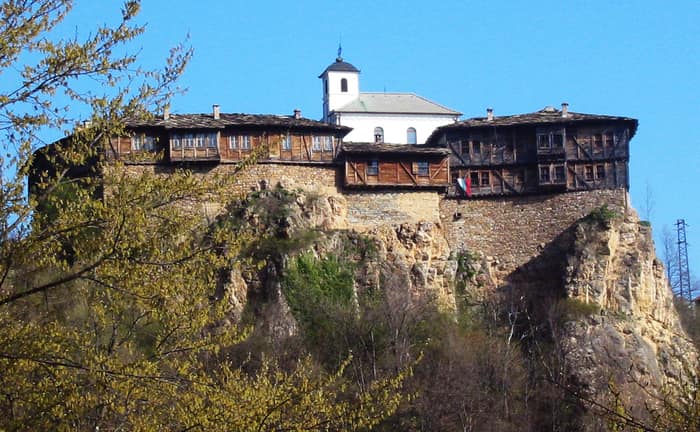 Glozhene Monastery perched on its rock in the Balkan Mountains